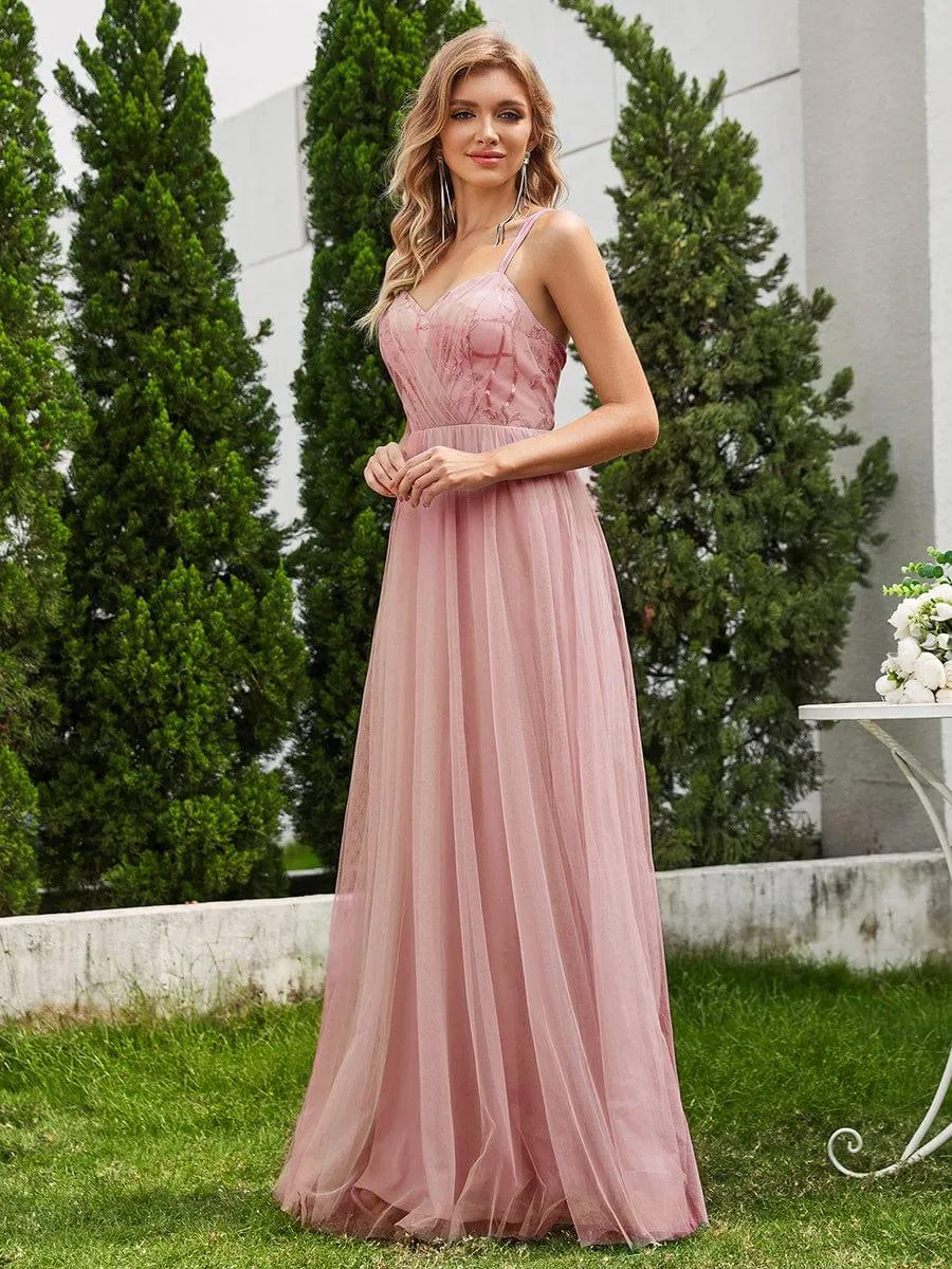 Robe de demoiselle d'honneur sans manches en tulle pailleté avec bretelles croisées dans le dos