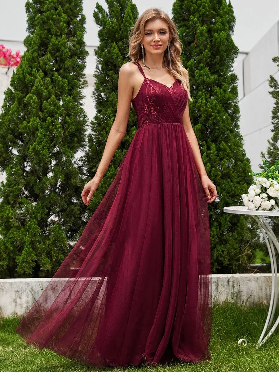 Robe de demoiselle d'honneur sans manches en tulle pailleté avec bretelles croisées dans le dos