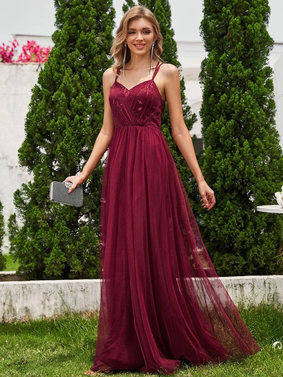 Robe de demoiselle d'honneur sans manches en tulle pailleté avec bretelles croisées dans le dos
