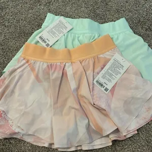 Two lululemon court skirts NWT